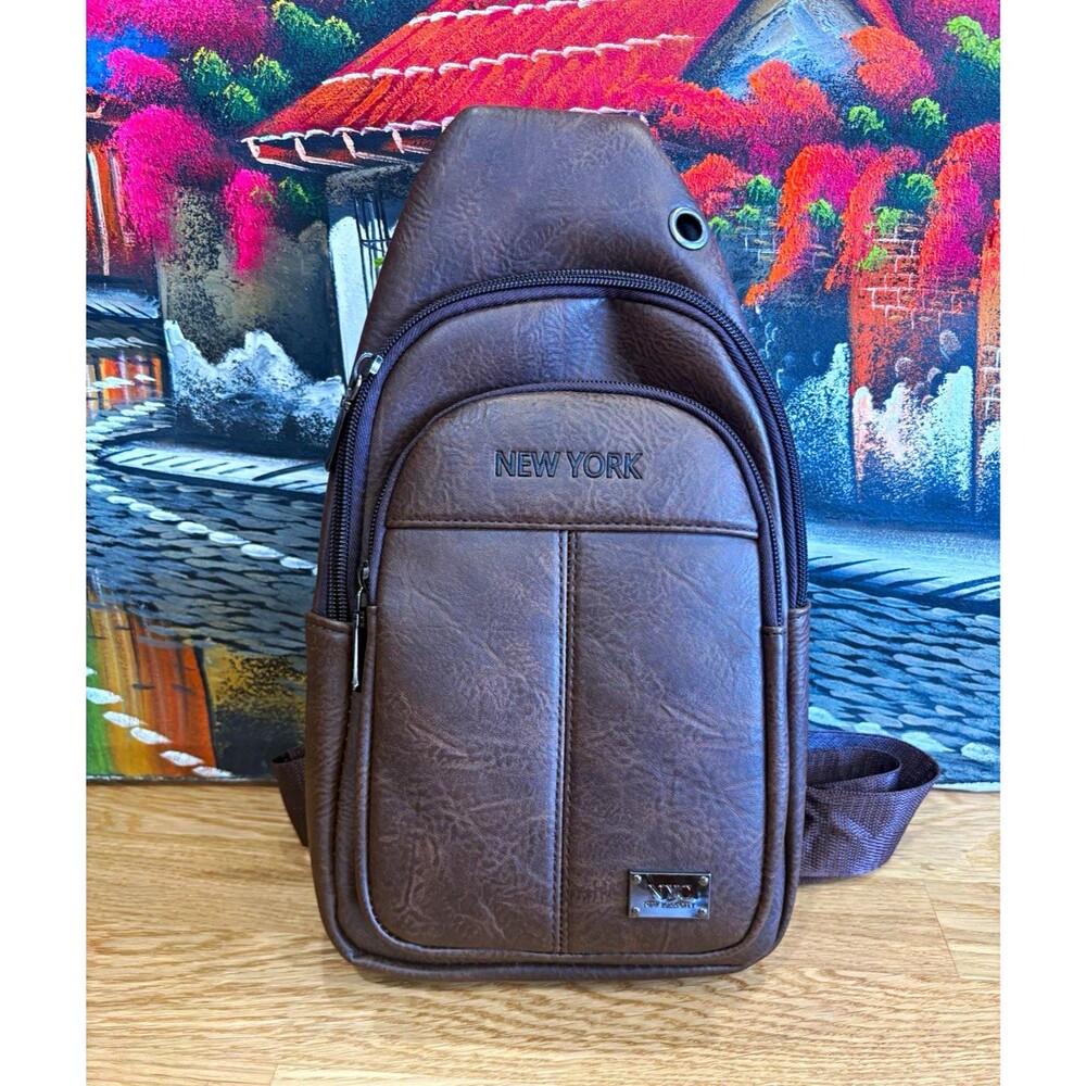 New York Brown Sling Bag Crossbody Pack Adjustable Strap Zip Closure Pockets
